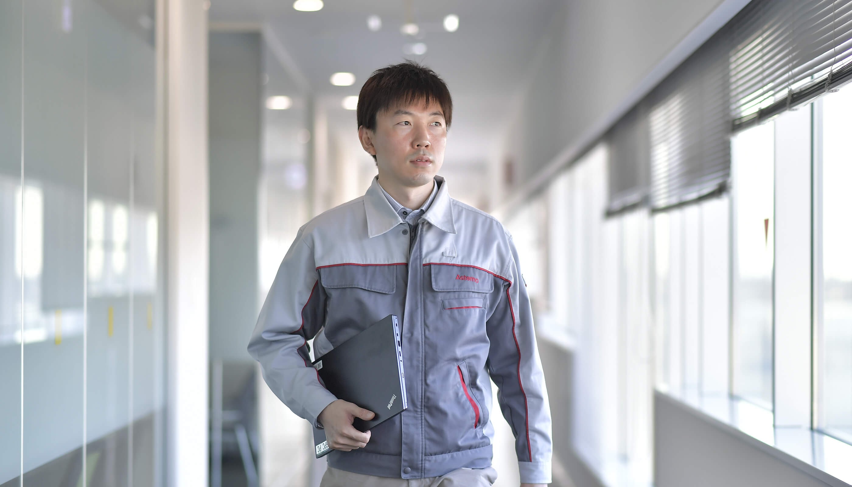 a person holding a folder