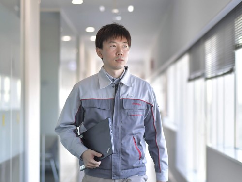 a person holding a folder