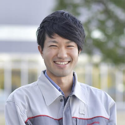 a person smiling at the camera