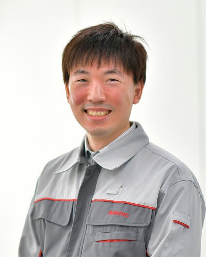 a person smiling at the camera