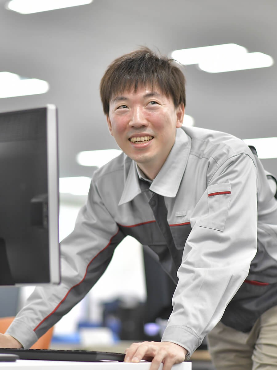 a person leaning on a computer