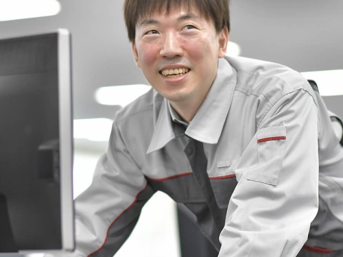 a person leaning on a computer
