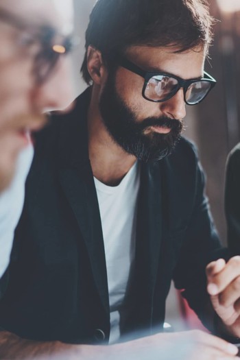 3 People Looking At Screen