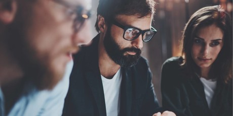 3 People Looking At Screen