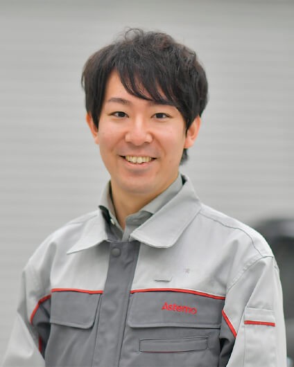 a person smiling for the camera