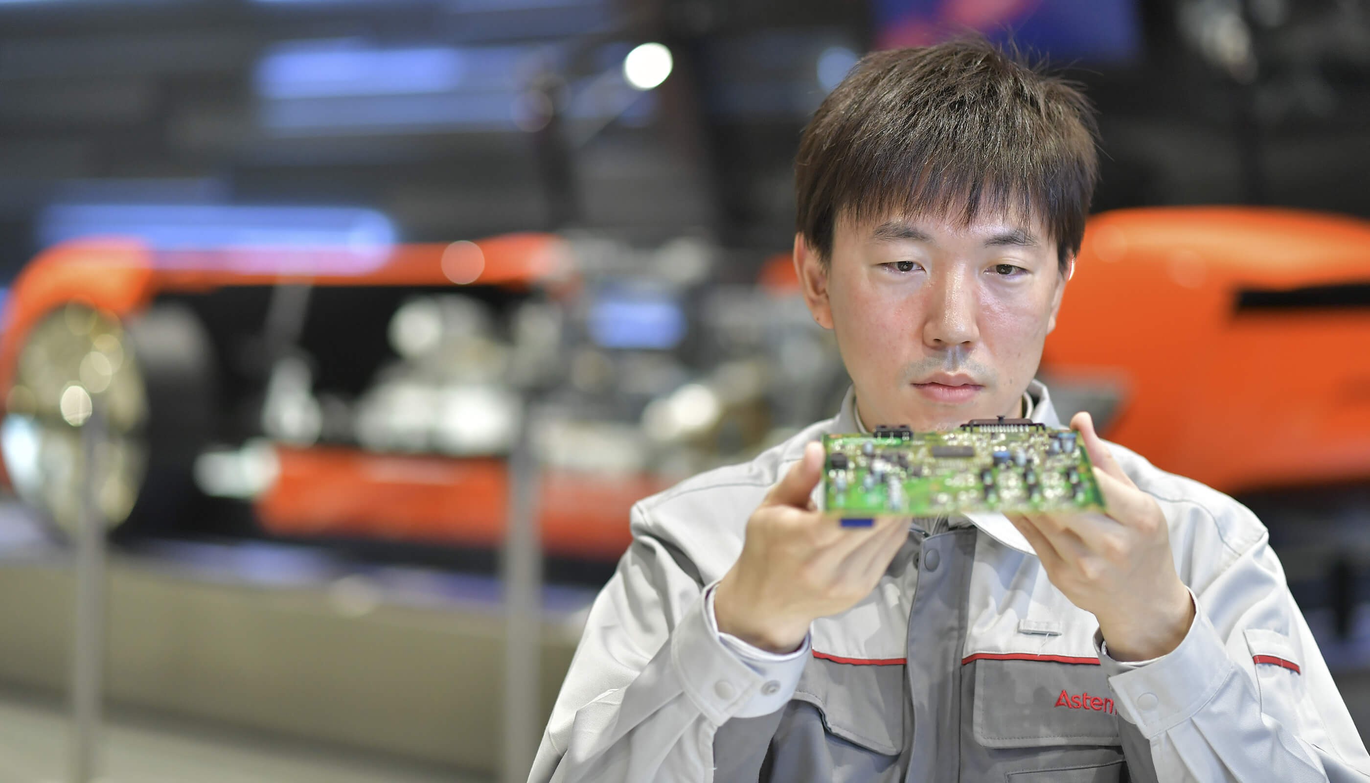 a person holding a green object