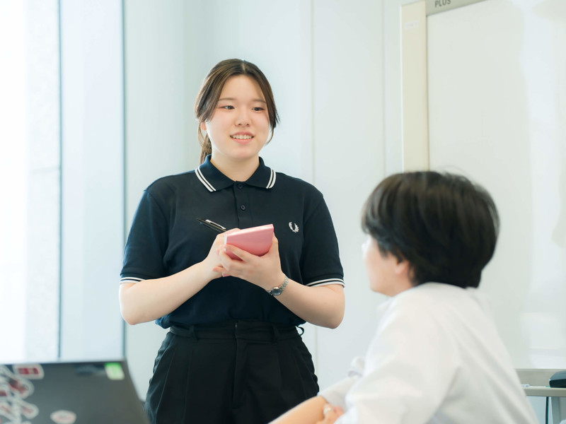A woman taking notes