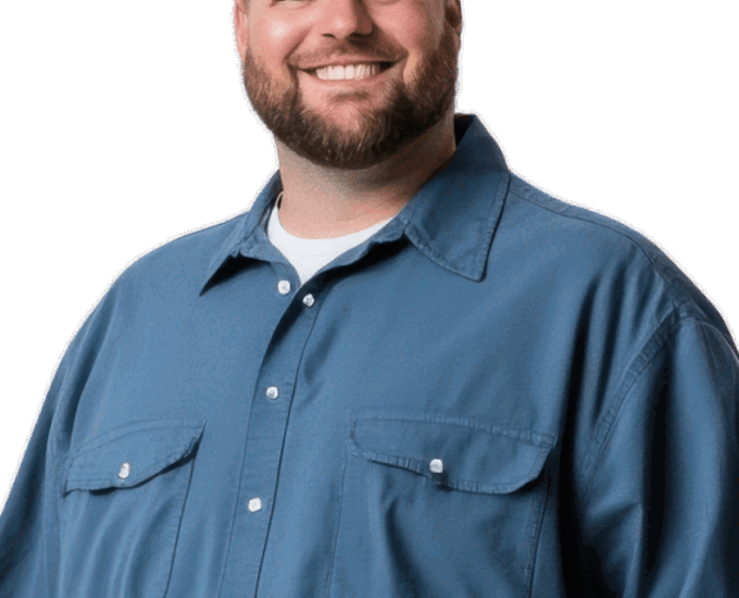 a person smiling with his hands in his pockets