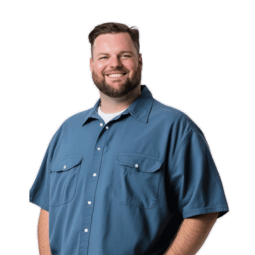 a person smiling with his hands in his pockets