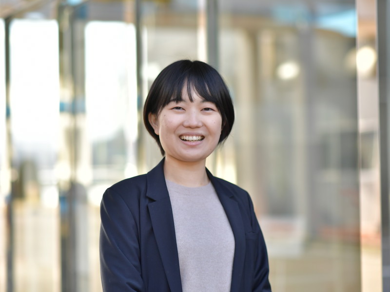 a person smiling at camera