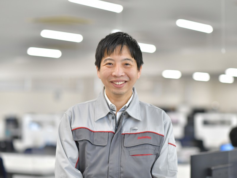 a person smiling at camera