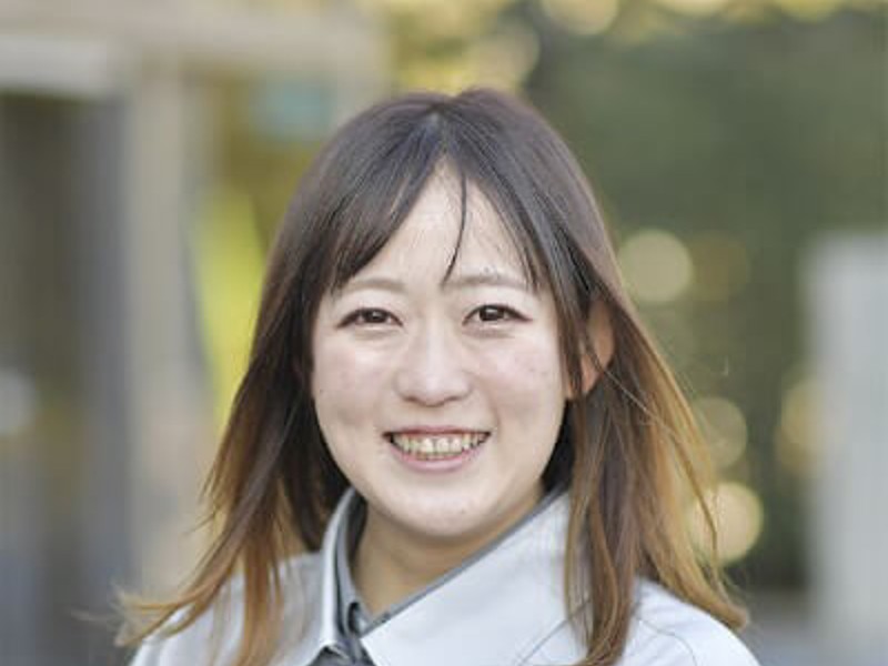 a person smiling for the camera