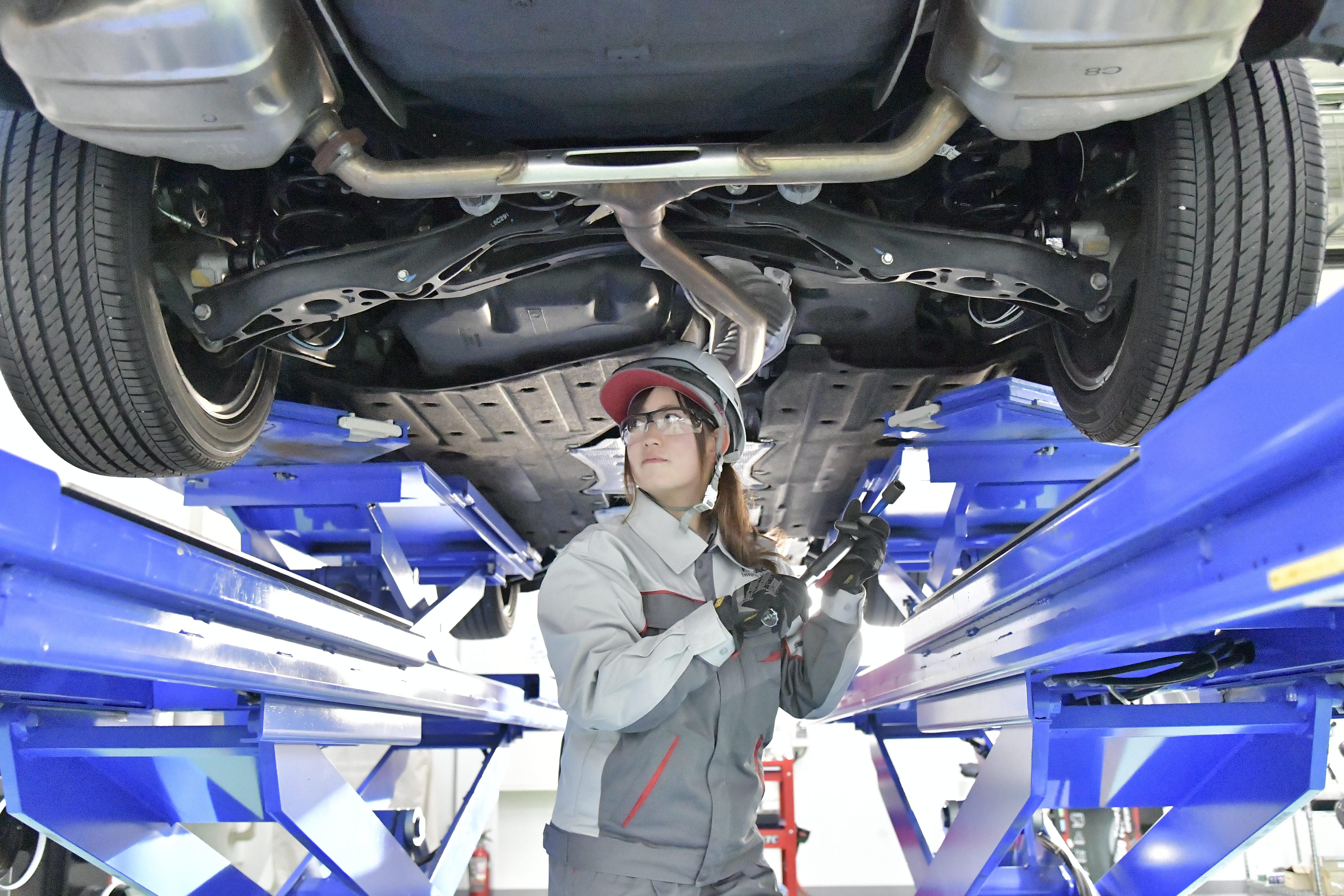 a person working under a car