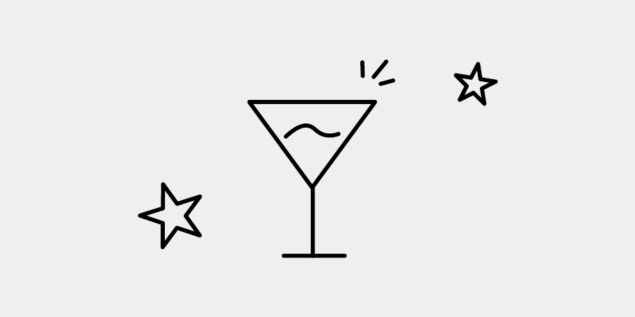 a black and white image of a glass with stars