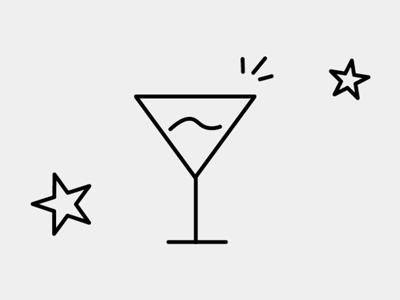 a black and white image of a glass with stars