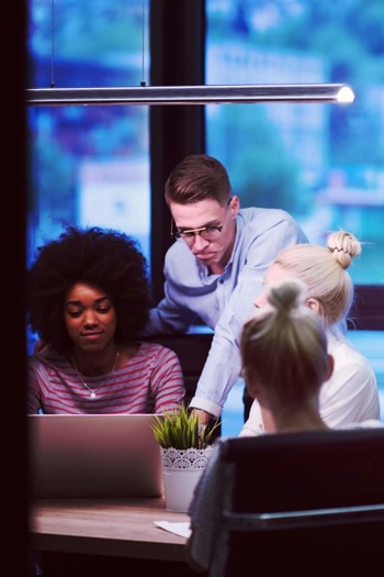 4 People In Boardroom