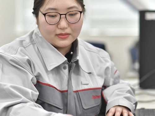 a person working on a machine